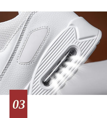 Stevvex white lace-up athletic running shoes with visible air-cushion sole and ribbed midsole on Tampa Home & Garden Store