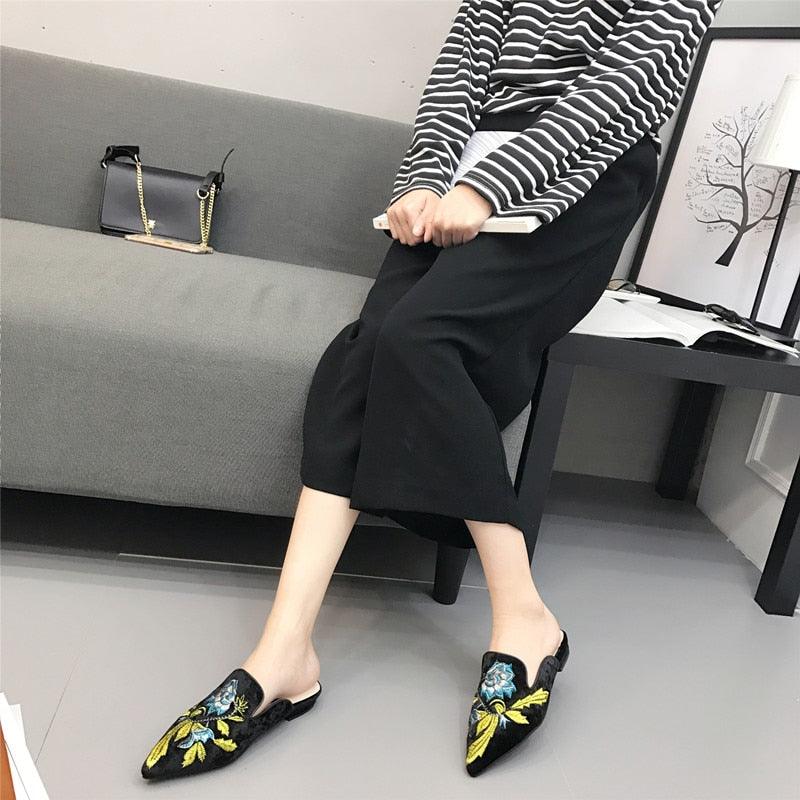 Stevvex women slip-on mules with colorful floral embroidery on black upper on Tampa Home & Garden Store
