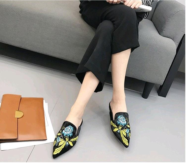 Stevvex women slip-on mules with blue floral embroidery on black upper, pointed toe sandals on Tampa Home & Garden Store