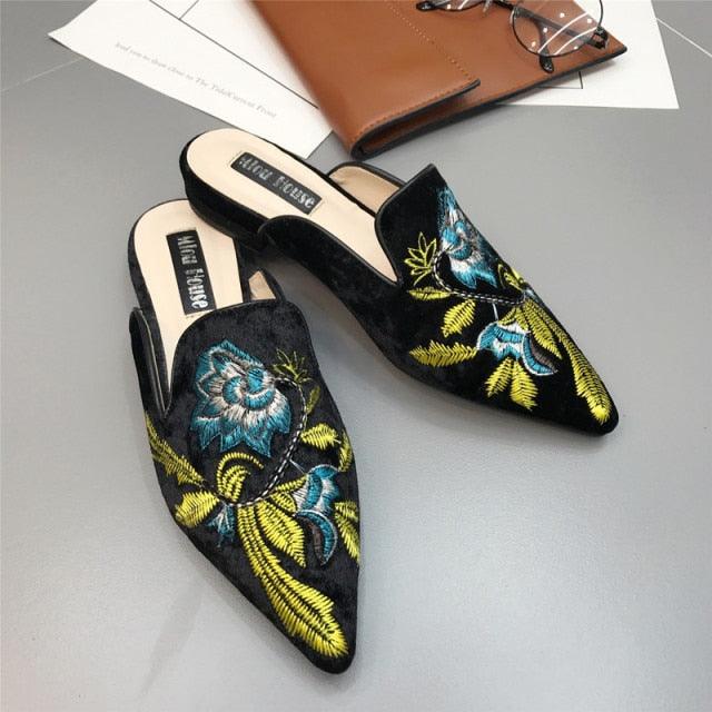Stevvex pair of women slip-on mules with blue and yellow floral embroidery on black velvet, pointed toe on Tampa Home & Garden Store