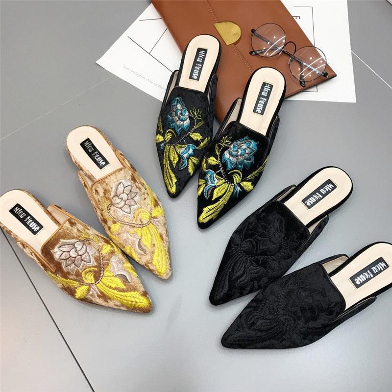 Stevvex Women Slip On Mules with embroidered floral details in black and gold colorways on Tampa Home & Garden Store