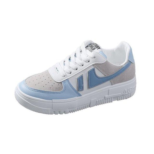 Stevvex white and light blue sneakers, lace-up with perforated toe and chunky sole on Tampa Home & Garden Store