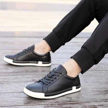 Stevvex men's black leather sneakers pair with white sole for casual walking on Tampa Home & Garden Store