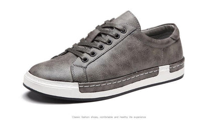 Stevvex men's fashion leather sneakers with grey-brown upper and white sole on Tampa Home & Garden Store