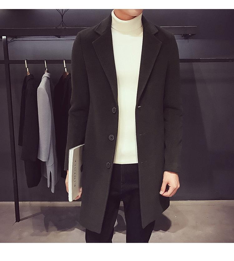 Stevvex men's long black trench coat, 3-button front, worn over a white turtleneck on Tampa Home & Garden Store