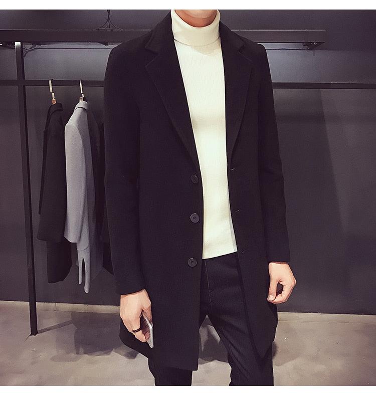 Stevvex men's black long trench coat with 3-button closure worn over a white turtleneck on Tampa Home & Garden Store