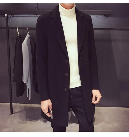 Stevvex men's black long trench coat with 3-button closure worn over a white turtleneck on Tampa Home & Garden Store