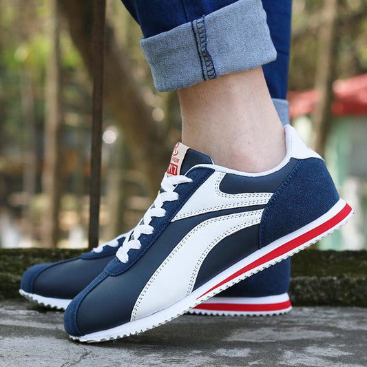Stevvex men's blue-white athletic sneakers with navy suede heel and red stripe sole on Tampa Home & Garden Store