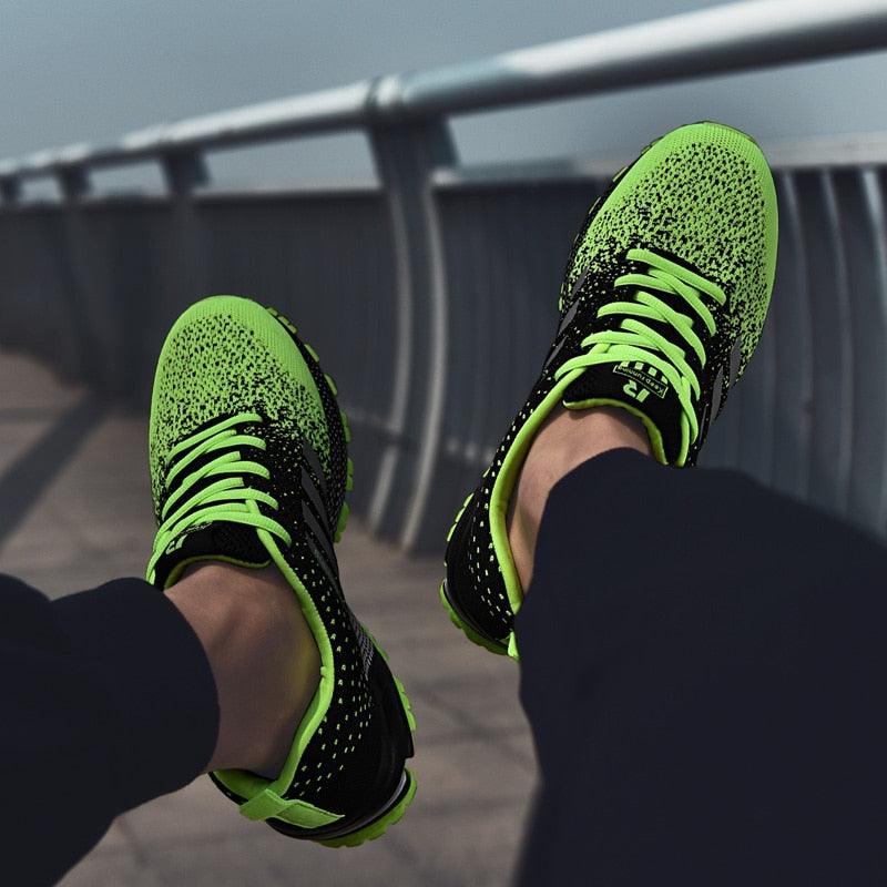 Stevvex athletic sneakers pair neon green running shoes with black knit upper and neon laces on Tampa Home & Garden Store