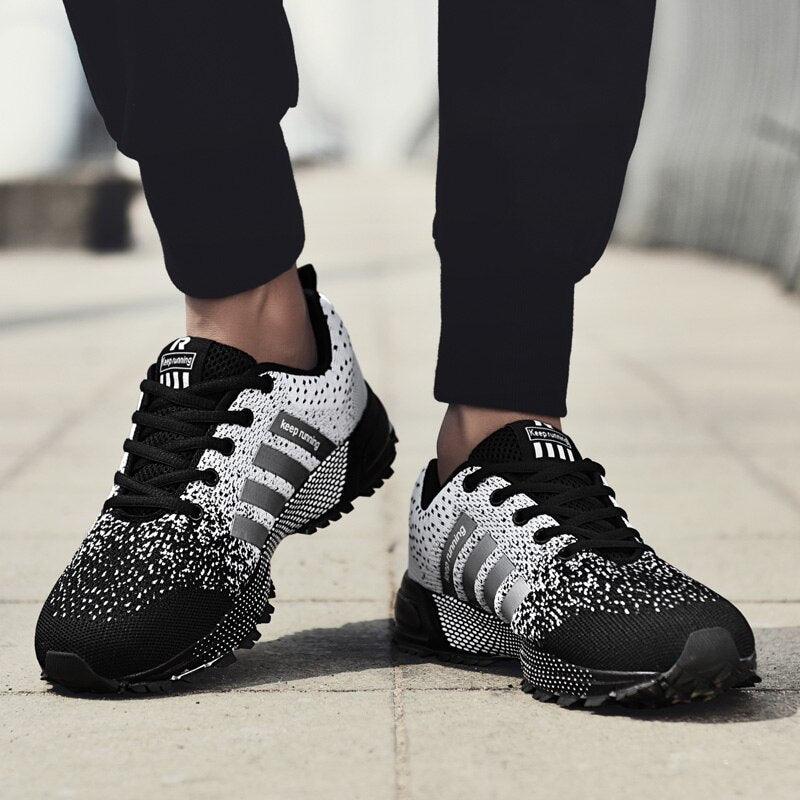 Stevvex fashion sneakers pair, black and white breathable knit upper, athletic style on Tampa Home & Garden Store