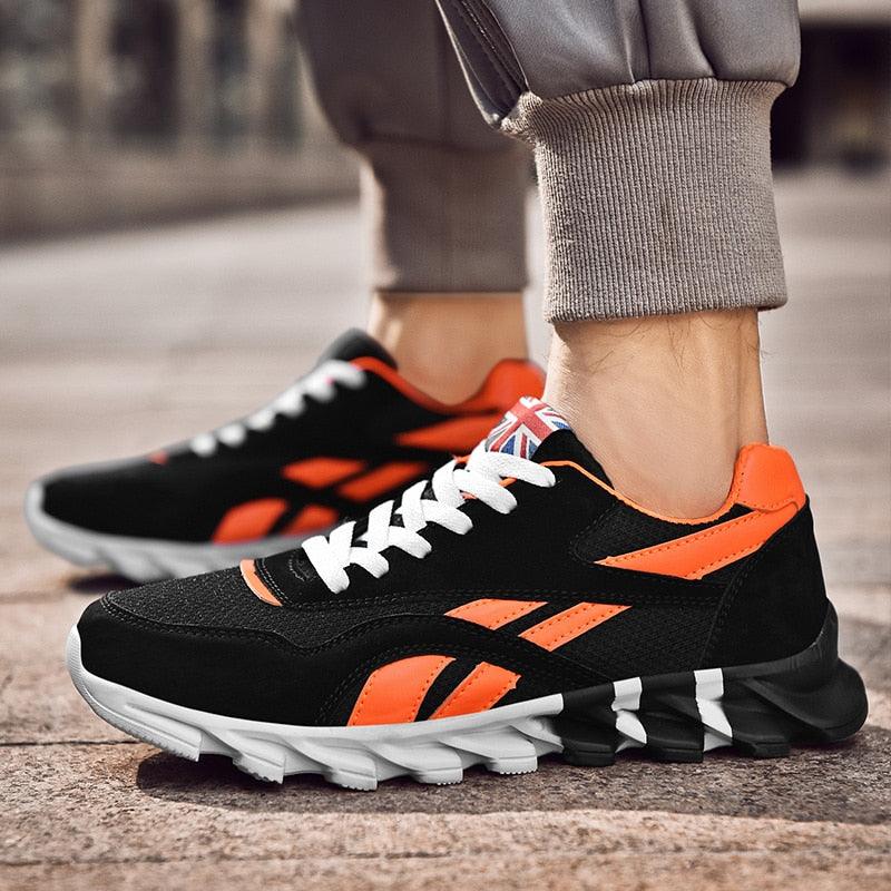 Stevvex men's running shoes pair, black with orange accents, white laces Union Jack badge on Tampa Home & Garden Store