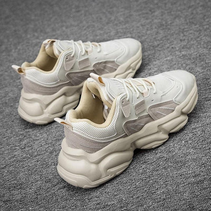 Men's white chunky-sole sneakers with mesh upper for casual wear on Tampa Home & Garden Store
