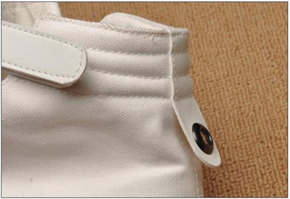 Stevvex white high-top canvas sneaker with padded collar and Velcro strap close-up on sneakers on Tampa Home & Garden Store