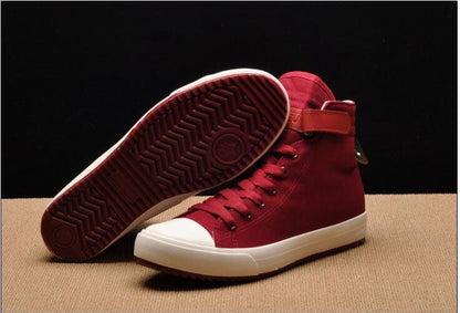 Maroon high-top canvas sneakers with white toe cap and sole, lace-up burgundy outsole on Tampa Home & Garden Store