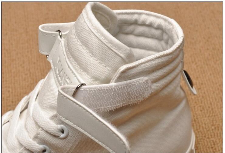 High-top white canvas sneakers by Stevvex with Velcro strap and lace-up design on Tampa Home & Garden Store