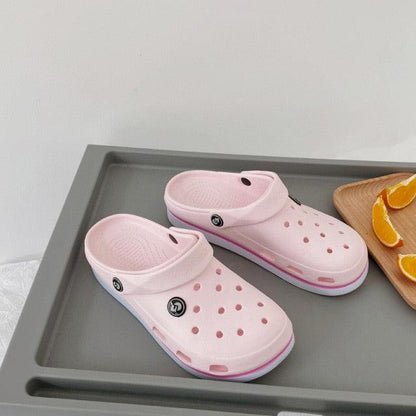 Womens Soft Eva Clogs by Stevvex, pink non-slip EVA beach slippers with holes, pair on Tampa Home & Garden Store