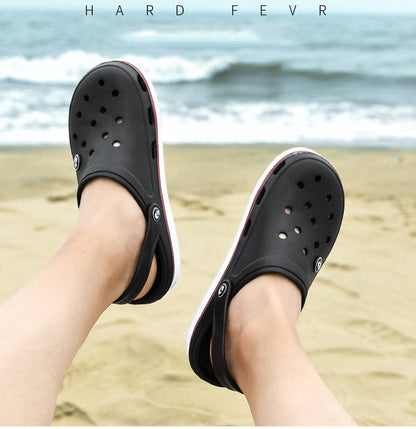 Stevvex men's black perforated clogs with ankle strap, lightweight beach slippers pair on Tampa Home & Garden Store