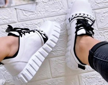 Stevvex white platform sneakers, a pair, with chunky ridged soles and black laces on Tampa Home & Garden Store