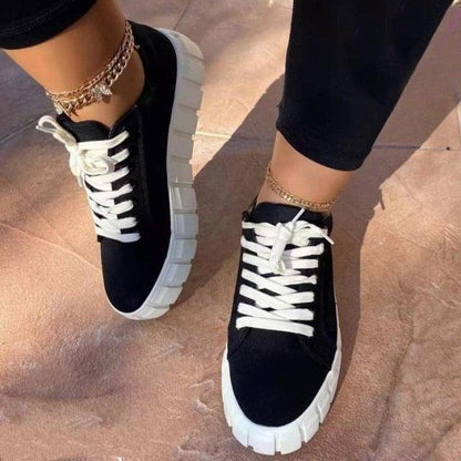 Stevvex women's platform sneakers black uppers with white laces and chunky white soles pair on Tampa Home & Garden Store