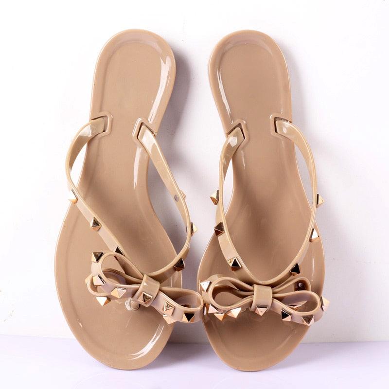 Stevvex nude bow flip flops with studded straps, pair of thong flat sandals on Tampa Home & Garden Store