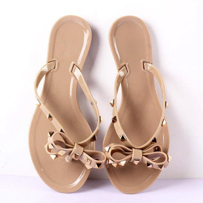 Stevvex beige bow flat sandals pair with studded straps for summer beach wear on Tampa Home & Garden Store