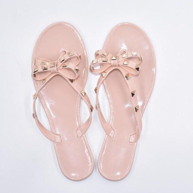 Pink bow knot flat sandals with studded straps, thong beach flip flops for summer on Tampa Home & Garden Store