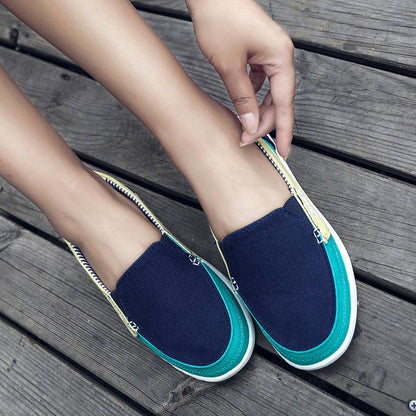 Stevvex women's navy canvas espadrille flats with teal trim zipper accents on white sole on Tampa Home & Garden Store