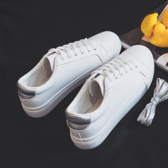 Stevvex white leather women’s sneakers, low-top lace-up casual shoes with silver heel tab on Tampa Home & Garden Store