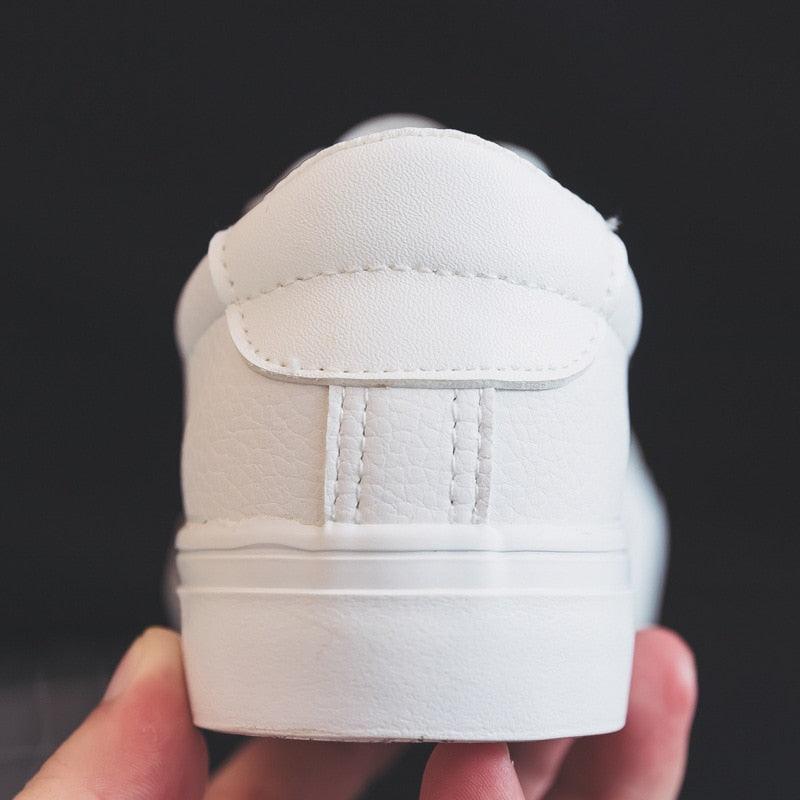 Stevvex women's white leather sneakers back view, classic low-top lace-up on Tampa Home & Garden Store