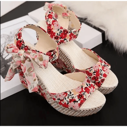 Stevvex floral wedge sandals pair with bow straps in red floral fabric on woven jute sole on Tampa Home & Garden Store