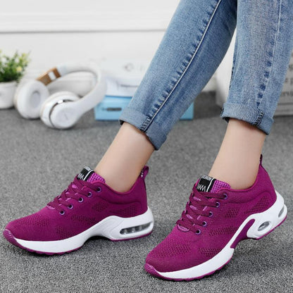 Stevvex womens athletic shoes Air Cushion, magenta mesh upper, white sole pair on Tampa Home & Garden Store