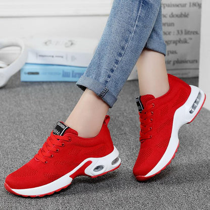Stevvex red athletic sneakers pair with breathable mesh upper and white air-cushioned sole on Tampa Home & Garden Store