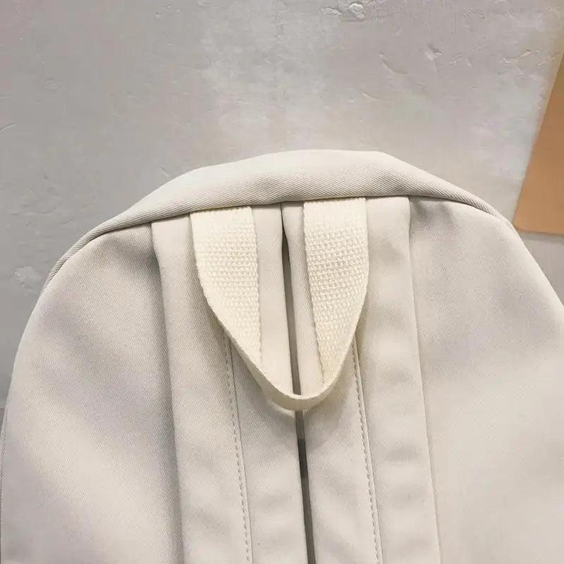 Fashionable laptop backpack for teens, cream solid color with canvas straps, anti theft on Tampa Home & Garden Store