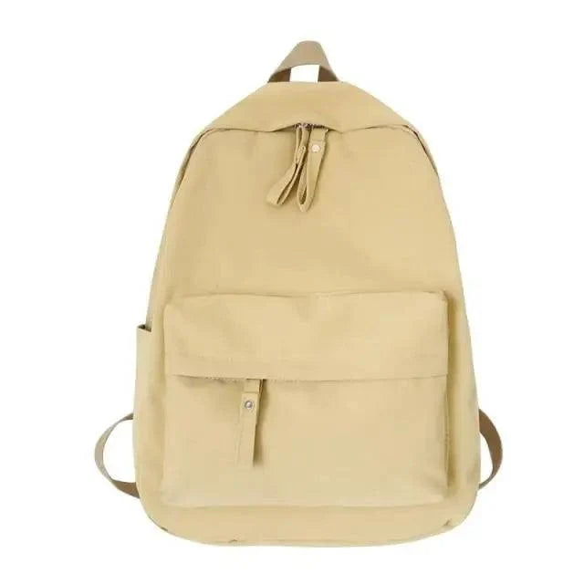 Stevvex beige laptop backpack with large front pocket and top dual zipper closure on Tampa Home & Garden Store