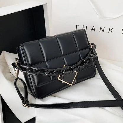 Fashionable Stevvex women's black quilted shoulder bag with chain strap and gold square pendant on Tampa Home & Garden Store