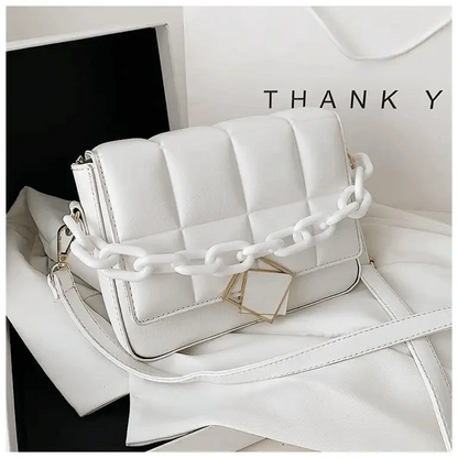 Stevvex ST93140LMN white leather shoulder bag with chunky white chain strap and gold charm on Tampa Home & Garden Store