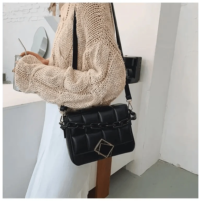 Fashionable women's shoulder bag with chain design in black faux leather on Tampa Home & Garden Store