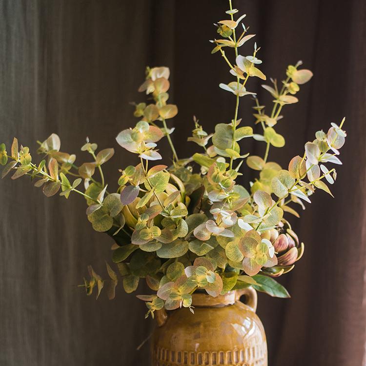 Faux Leaf Autumn Eucalyptus artificial stem in a ceramic vase with green, gold, brown leaves on Tampa Home & Garden Store