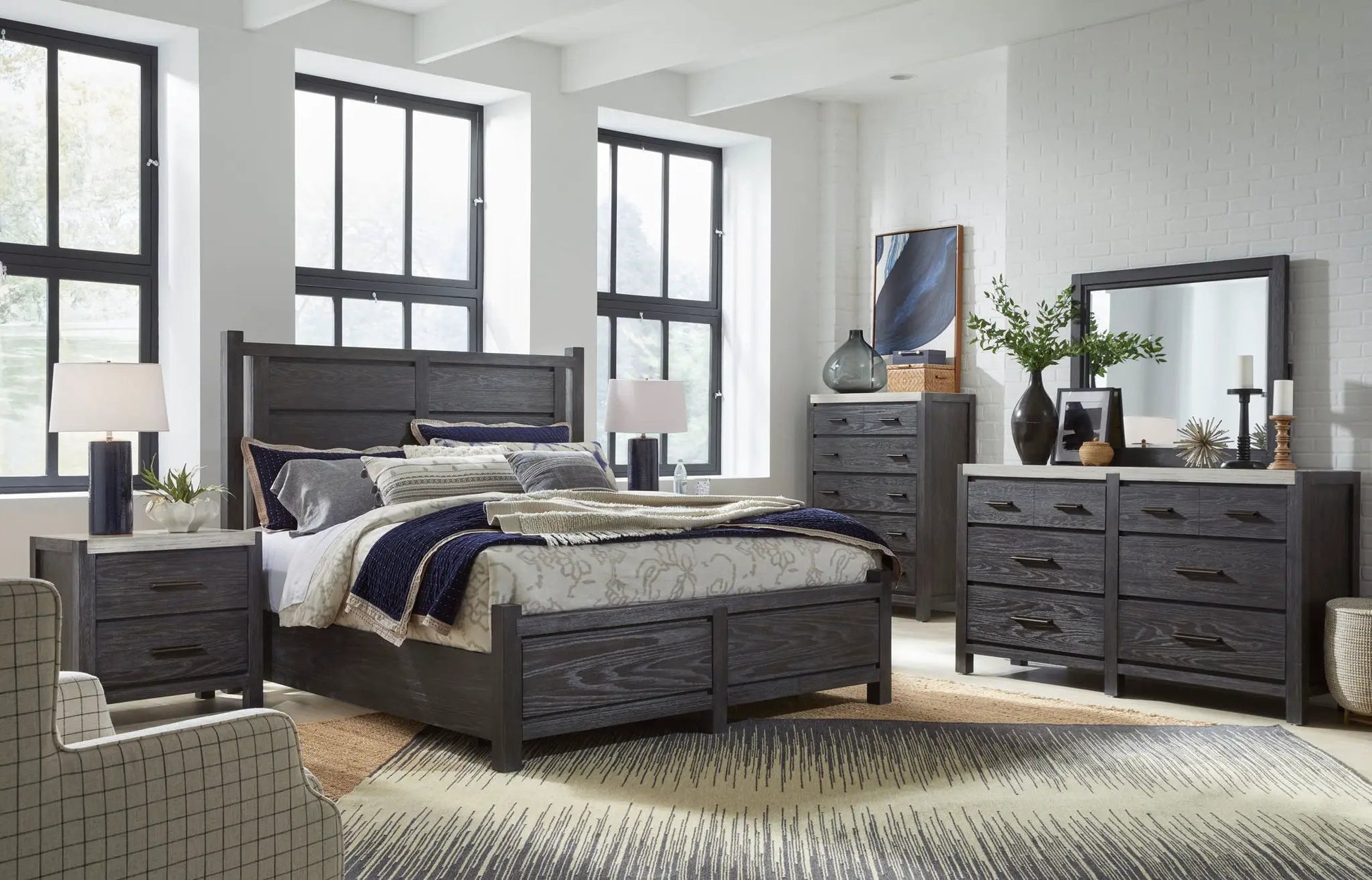 Plum Creek Panel Bed in dark charcoal wood with coordinating dresser and nightstands on Tampa Home & Garden Store