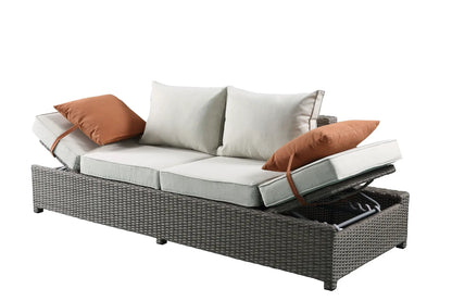 Salena all-weather wicker sofa and ottoman set beige cushions and 2 rust-orange pillows on Tampa Home & Garden Store