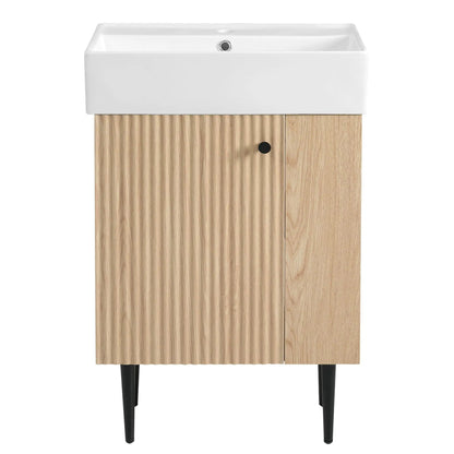 Bathroom vanity with a white ceramic sink on a light oak cabinet with vertical doors on Tampa Home & Garden Store