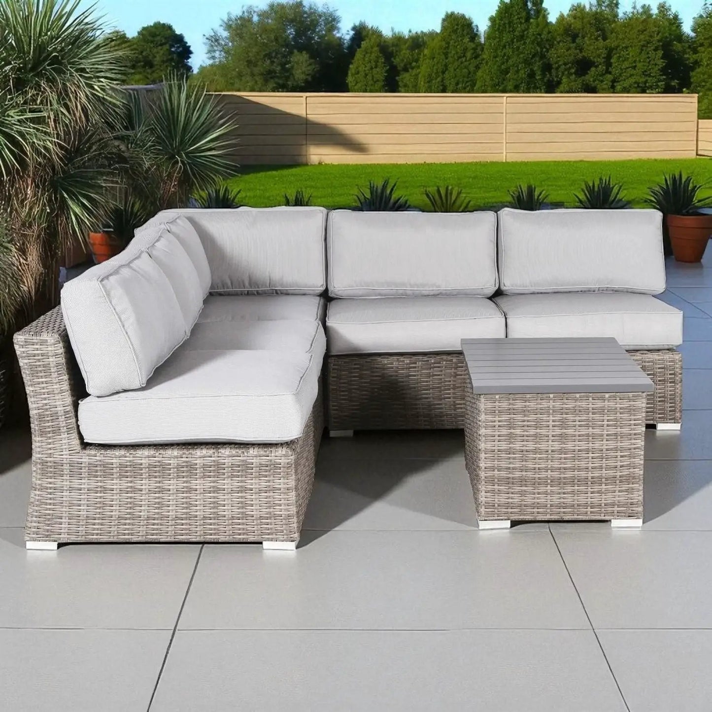 Wicker outdoor 2-piece sectional with light cushions and table by Unique Piece Furniture on Tampa Home & Garden Store