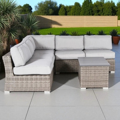 Wicker outdoor 2-piece sectional with light cushions and table by Unique Piece Furniture on Tampa Home & Garden Store