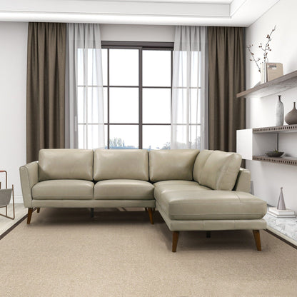 Benson sectional sofa with chaise in beige leather and wooden legs in a modern living room on Tampa Home & Garden Store