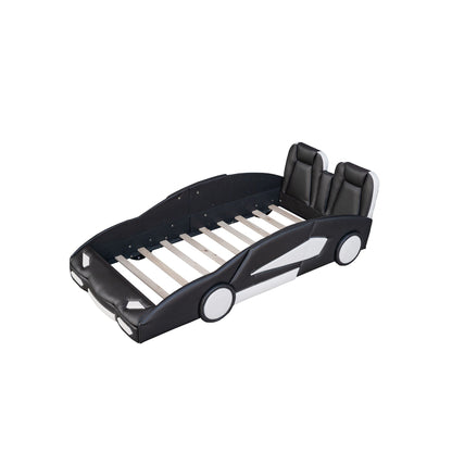 Race car shaped twin platform bed with pine frame, black upholstery, white wheel accents on Tampa Home & Garden Store