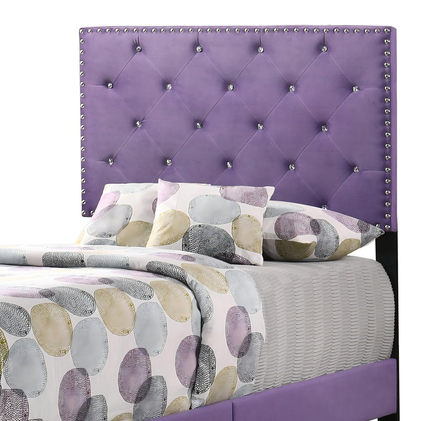 Luxurious upholstered bed headboard in purple with diamond tufting and silver nailhead trim on Tampa Home & Garden Store