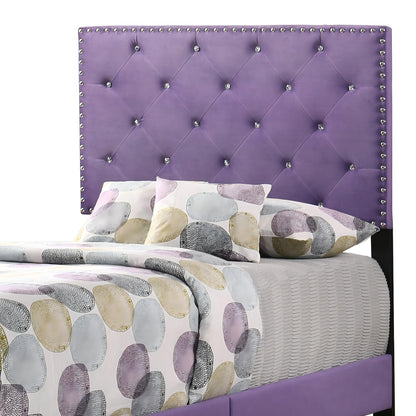 Luxurious upholstered bed headboard in purple with diamond tufting and silver nailhead trim on Tampa Home & Garden Store