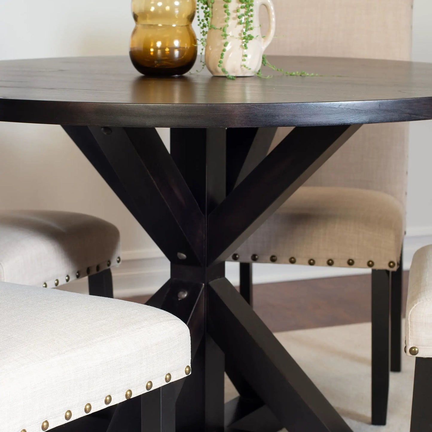 Mytzi 5-Piece Dining Set: cross-buck table in dark finish with four beige upholstered chairs on Tampa Home & Garden Store
