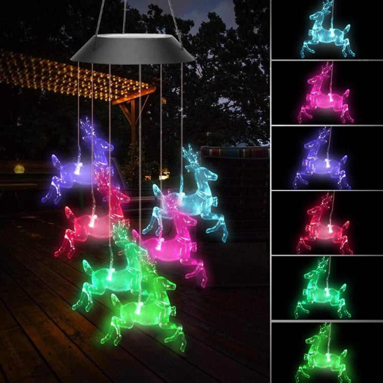 Outdoor Solar Wind Chime Lamp with color-changing LED animal figures on Tampa Home & Garden Store