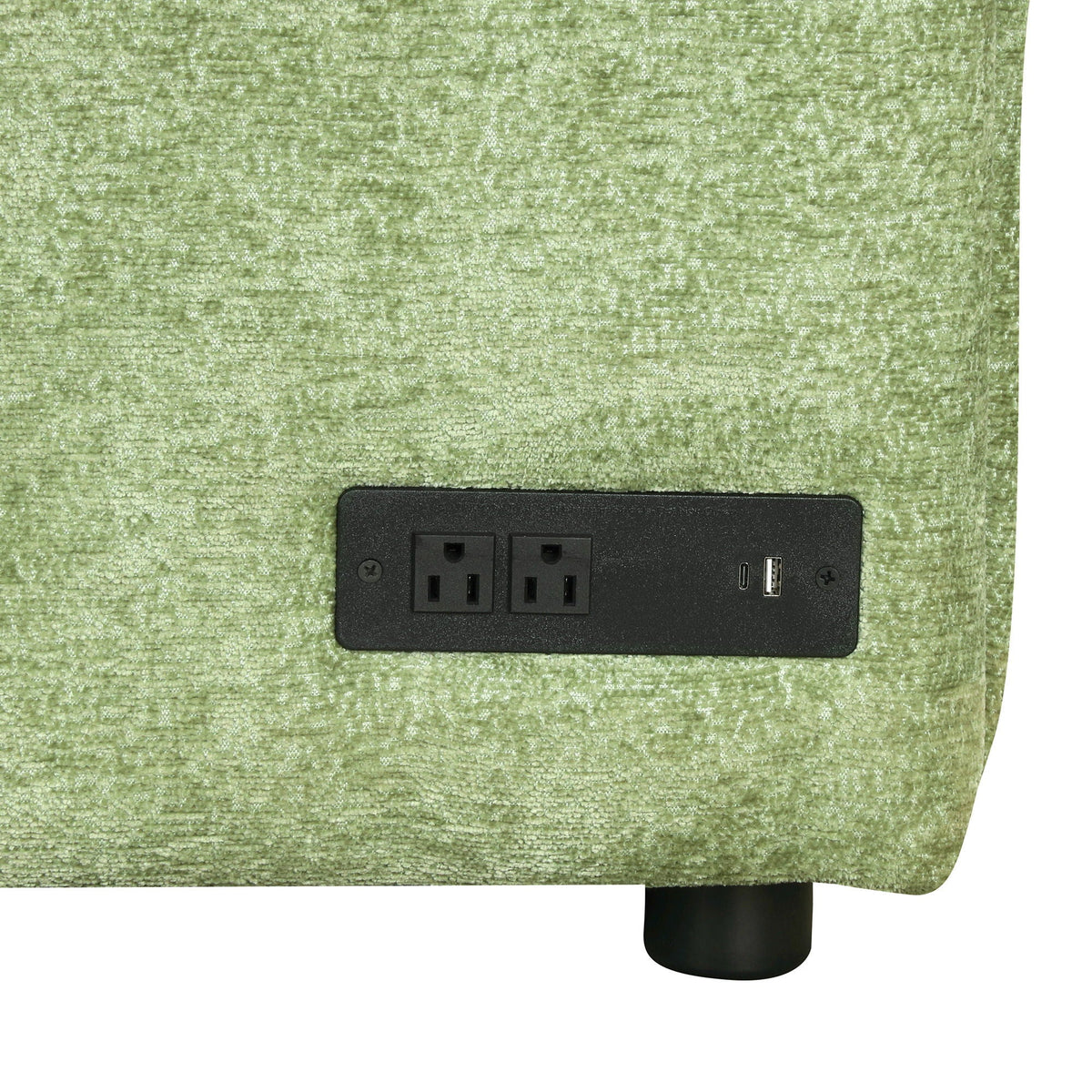 Power outlet panel with two sockets and USB ports on a green carpet on Tampa Home & Garden Store